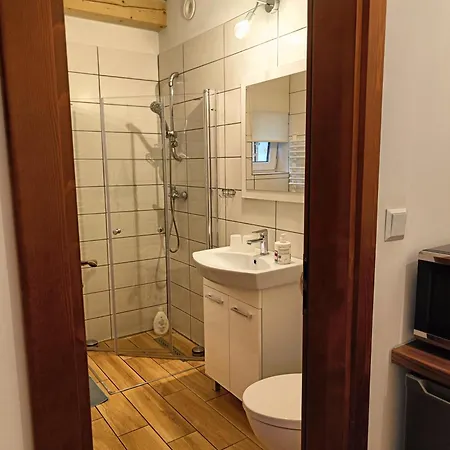 Pod Modrzewiami Habitación en casa particular